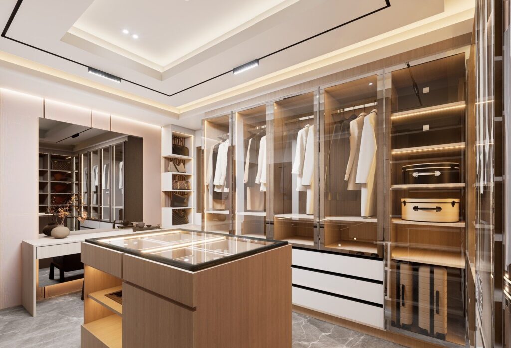 A spacious, luxurious walk-in closet with contemporary design and elegant lighting.